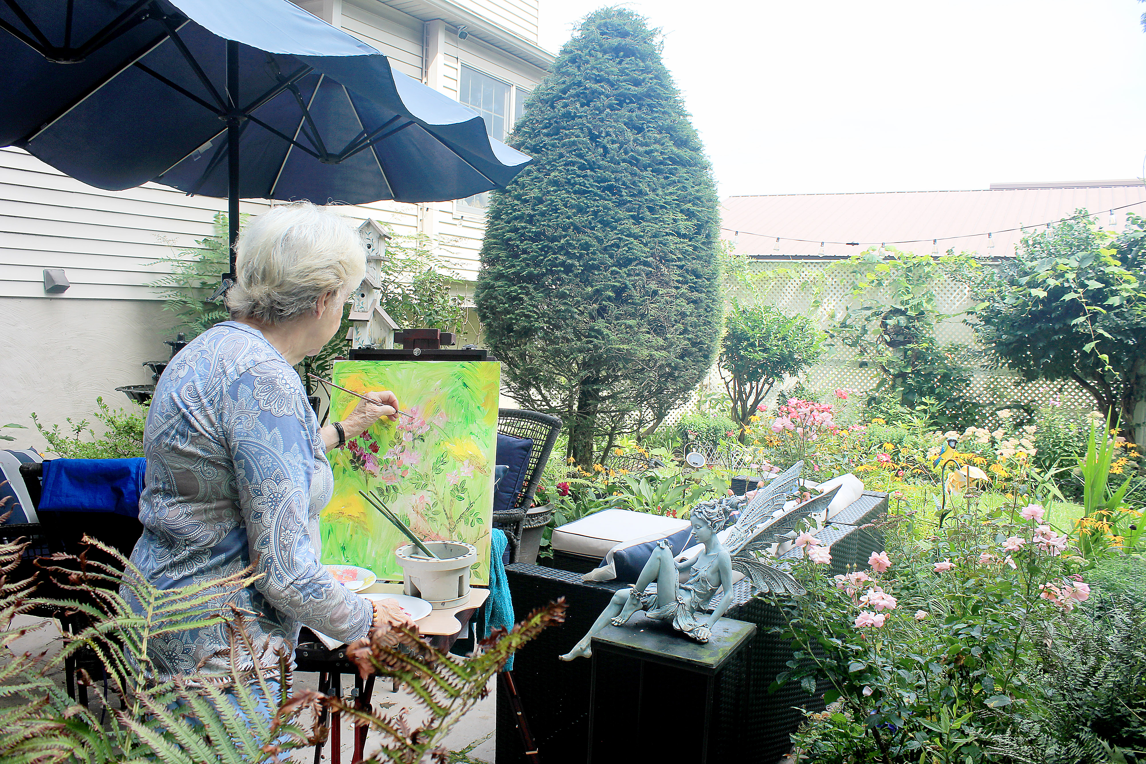 In full bloom: Cresson artist transforms garden behind studio into sanctuary